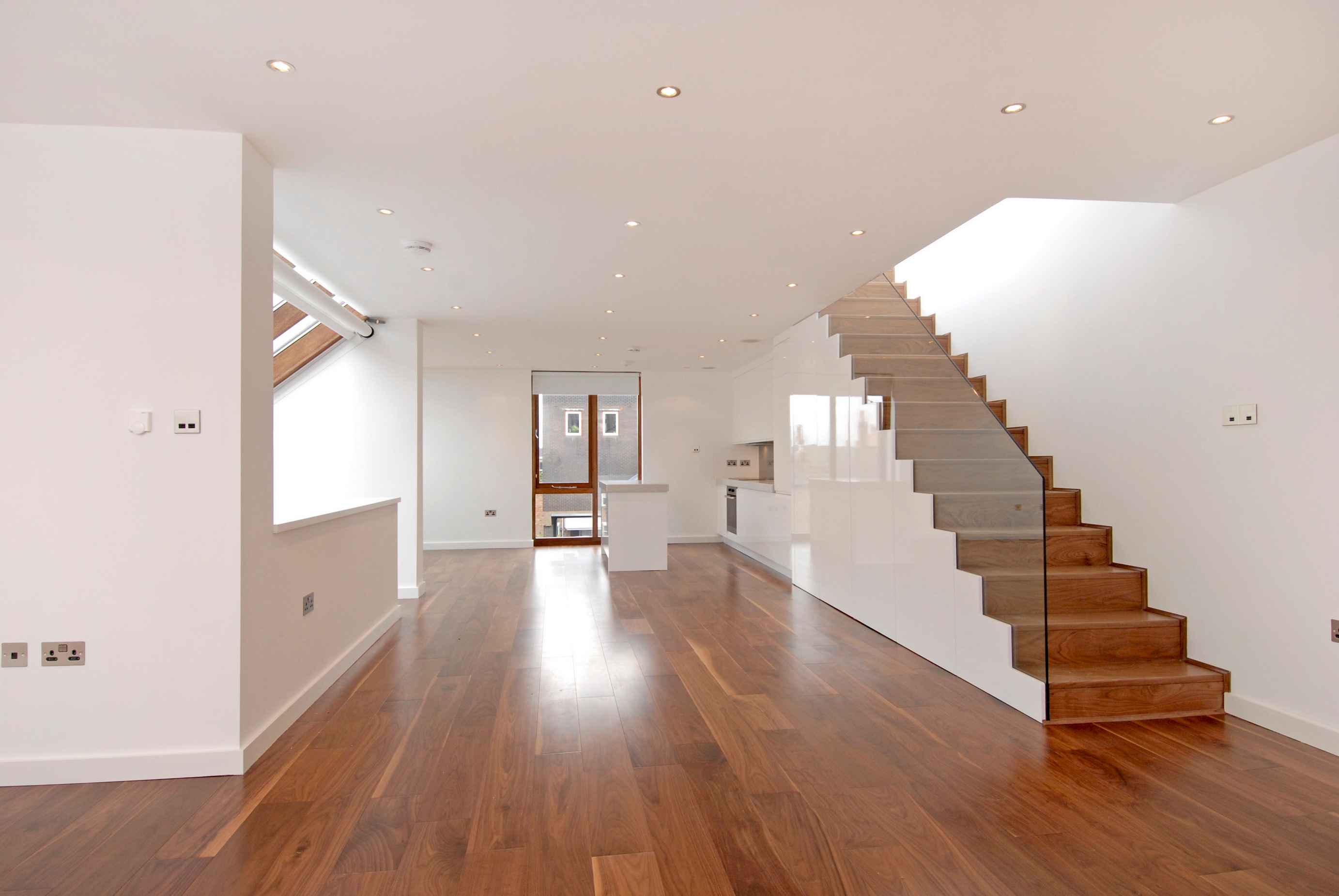 glass ballastrading staircase from Higginson Staircases
